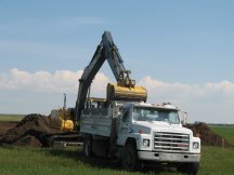 Stripping the top soil