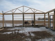 The first truss goes up