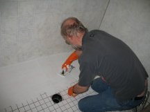 Grouting the shower floor