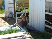 Hilary working on the front of the shed