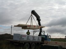 Subfloor arrives and is unloaded