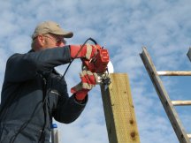 Cutting notches in the tops of the posts