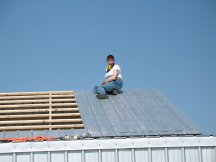 Tracy on the roof peek