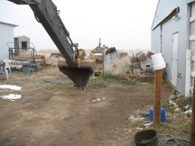 Trenching water from the barn to the house