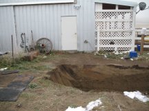 Trenching water from the barn to the house
