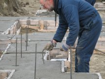 Alan placing rebar dowells