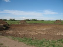 Jock finishes stripping topsoil