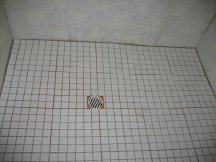 Laying the tile in the shower