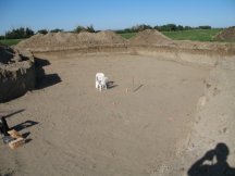 Laying out the house again in the bottom of the pit