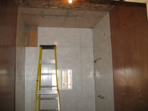 Working on the top of the shower