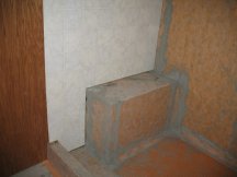Working on the shower wall