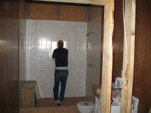 Working on the shower wall