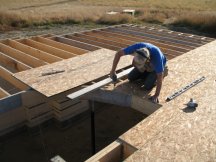 Starting to put the subfloor around the stairs